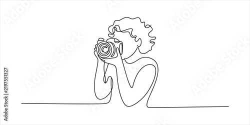 Continuous single line drawing of a person holding a camera taking a photo