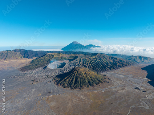 Konstfotografi Volcanic peak dominates rugged, barren landscape
