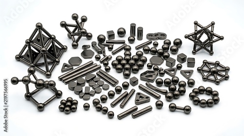 Magnetic building toy set with metal spheres and rods on white background