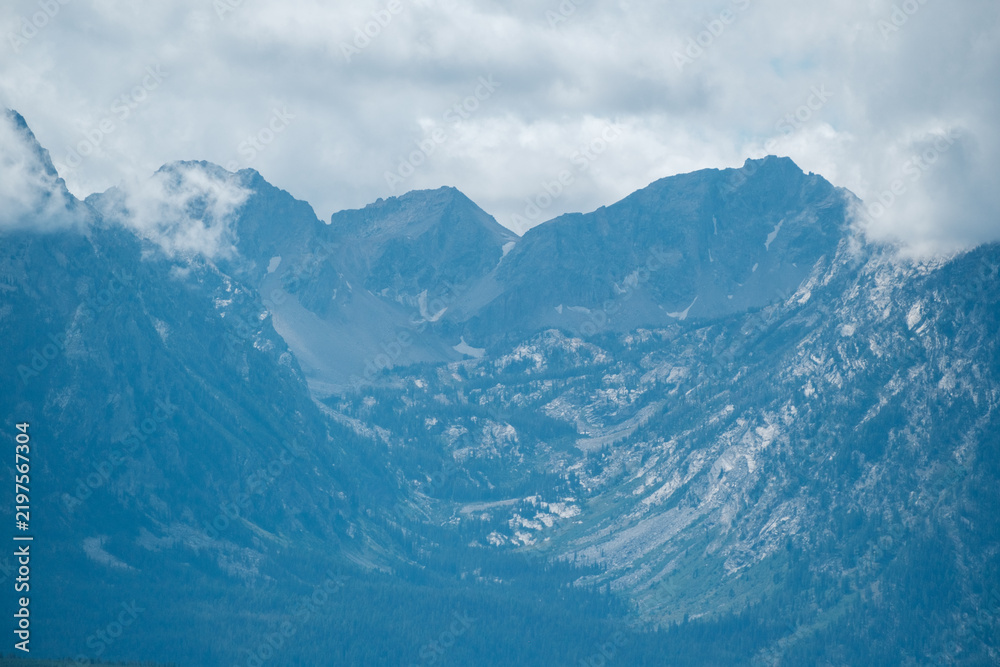 Fototapeta premium Jackson Lake with Moody Cloud Formation Teton Range Alternate View