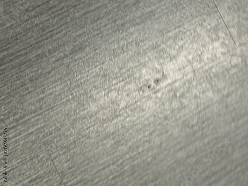 Abstract metallic texture with nuanced details creating a unique background effect for various designs.