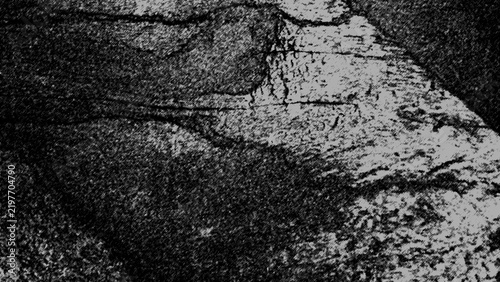 The rough texture is reminiscent of old wood or a weathered surface. The dark tones contrast with the lighter lines. This image evokes the impression of an ancient, unspoiled landscape or historic