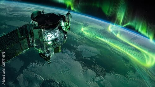 Polar Orbit Satellite Passing Above Green Aurora Borealis Night Sky, Spacecraft Monitoring Northern Lights Over Curved Planet Earth Horizon
