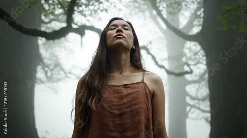 Woman Eyes Closed Breathing In Misty Forest. 4K Video