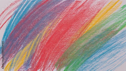 Childlike Strokes of Color: Vibrant streaks of crayon art depict a rainbow of colors, from fiery red to cool blue, with yellow and green intermingling, showcasing a child's imaginative expression.