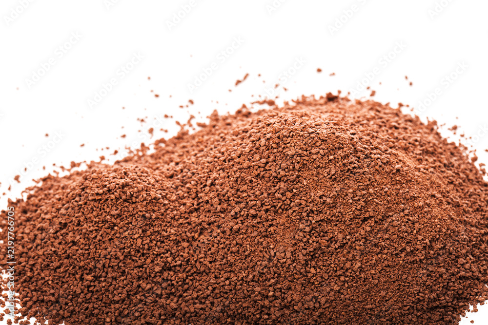 Obraz premium Pile of cocoa powder isolated on white background.