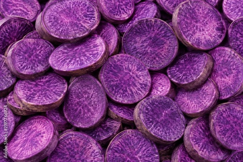 Purple Potato Slice Background. Slice Vegetable Background.