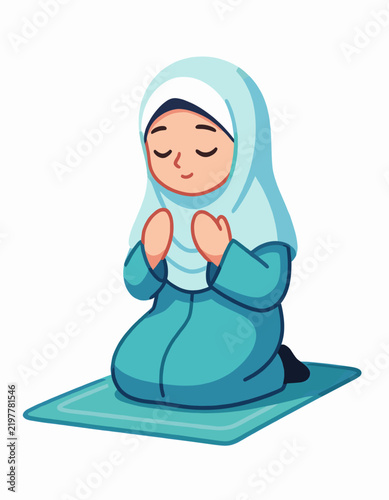 Young Girl Praying in Hijab on Prayer Mat