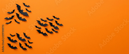 Black Bat Silhouettes Flying on Orange Background - Halloween Party Decoration