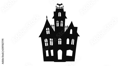 Silhouette of a spooky haunted house with towers and windows