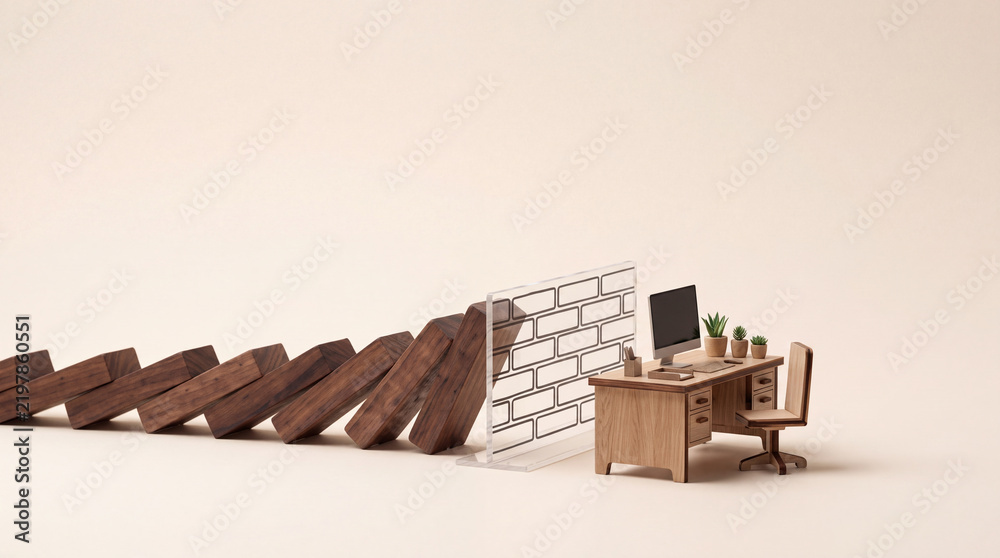 Fototapeta premium Conceptual Miniature Scene of Falling Wooden Domino Blocks Being Stopped by a Transparent Brick Wall Barrier Protecting a Small Office Desk Setup, Symbolizing Risk Management and Security