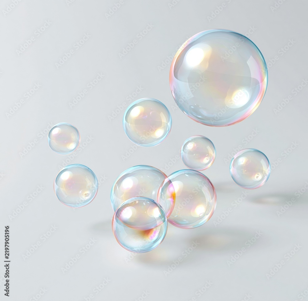 Fototapeta premium Iridescent soap bubbles floating on white background