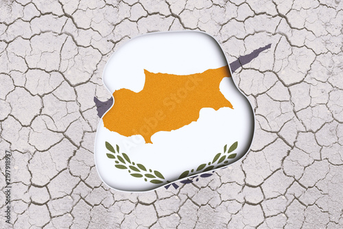 Fotografie Cyprus Map on Dry Cracked Earth Symbolizing Environmental Drought Crisis and Glo