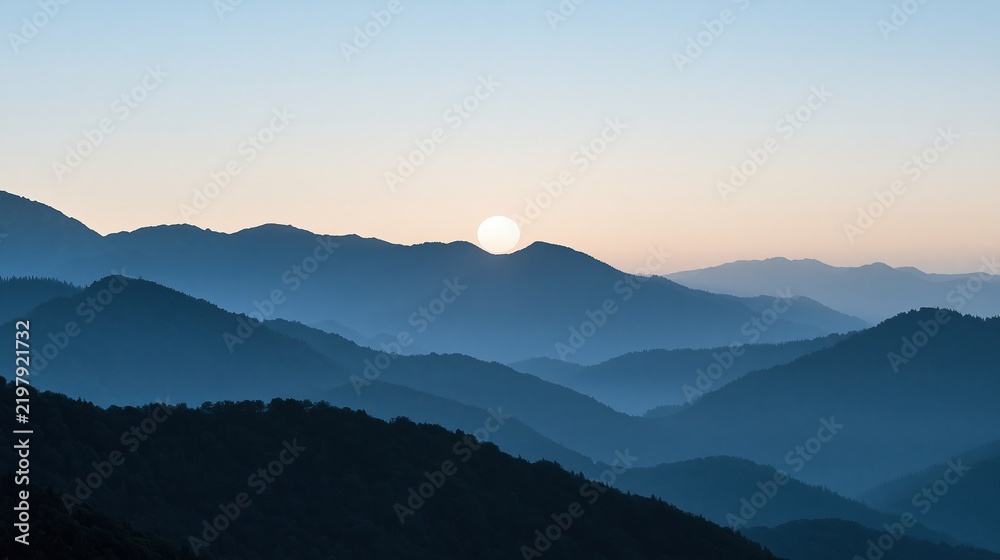 Fototapeta premium Full moon rises above layered mountain silhouettes
