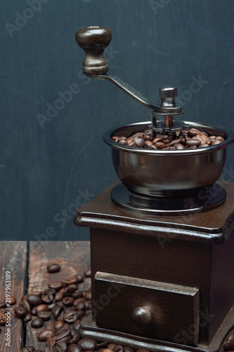 grinder , coffee beans. Selection of fresh coffee for espresso.  wooden background, copyspace.