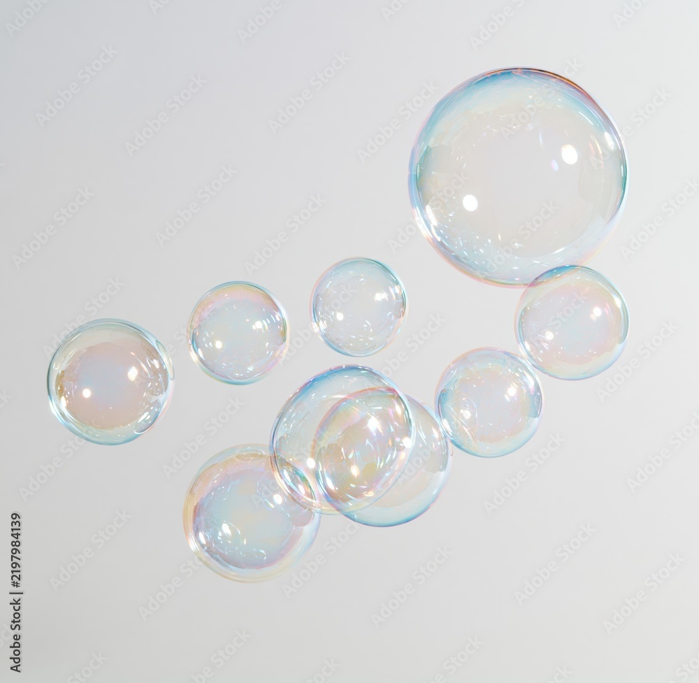 Fototapeta premium Colorful soap bubbles floating against white background