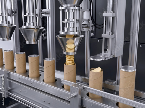 Automated industrial packaging line filling paper canisters with potato chips