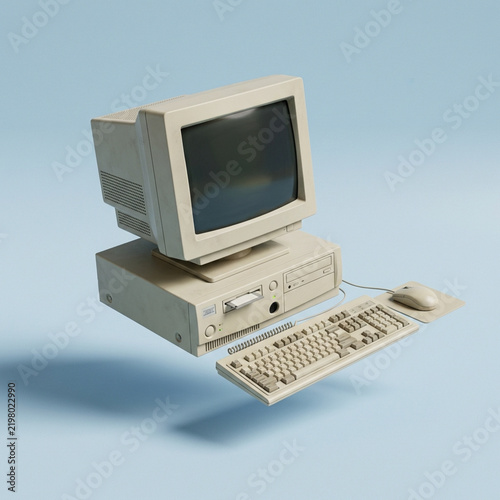 Retro vintage desktop computer hovering over blue background