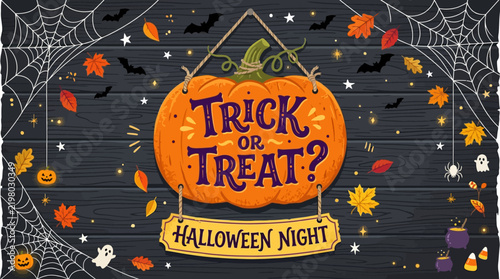 Trick or treat halloween sign hanging on a wooden background