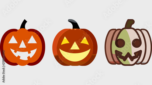 Three carved orange Halloween jack-o-lantern pumpkins with various glowing faces.