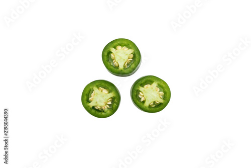 Green jalapeno pepper slices with seeds isolated on transparent background. Fresh spicy chili rings, organic raw hot vegetable ingredient for Mexican food design.