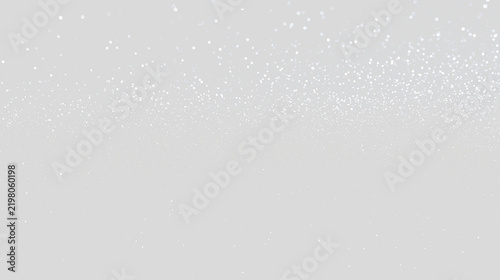 Shimmering silver glitter particles falling on transparent background. Magic sparkle dust overlay. Festive celebration background