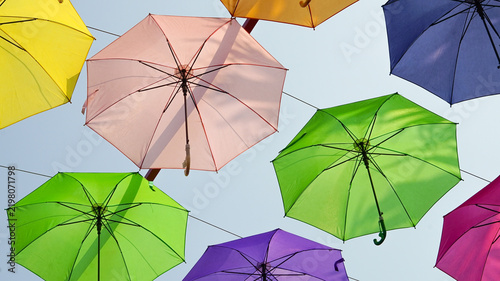 colorful umbrellas in the sky