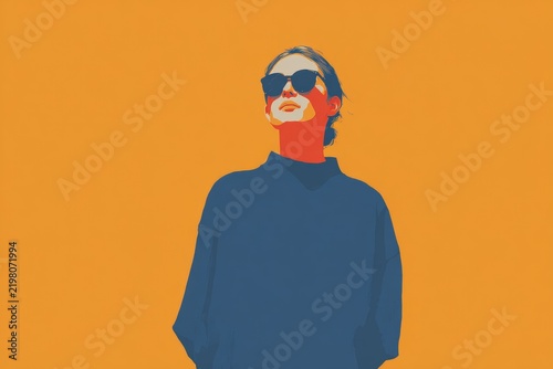 A man wearing a blue sweatshirt and sunglasses against an orange background. he has a serious expression on his face and his eyes are focused intently on something in the distance.