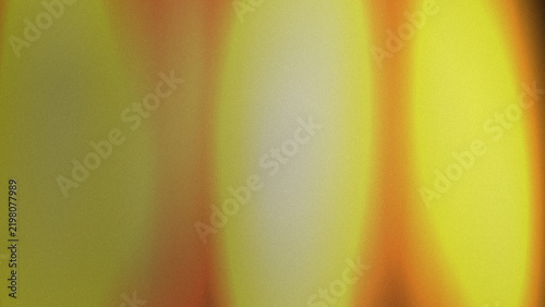 Blurred vertical bands of yellow and orange create an abstract gradient background stripes warm hues
