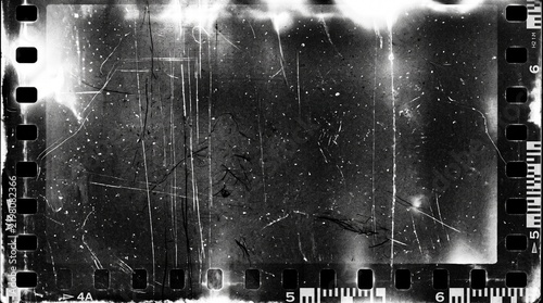 Old film texture with scratches, noise and light leaks. Realistic transparent overlay film texture in black-white, dust and grain. Distressed retro movie or photo negative effect of cinema nostalgia