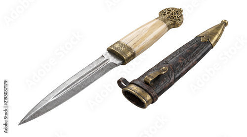 Vintage ceremonial dagger with ornate brass hilt and ivory handle, antique steel dirk with decorative leather scabbard, historical military sidearm