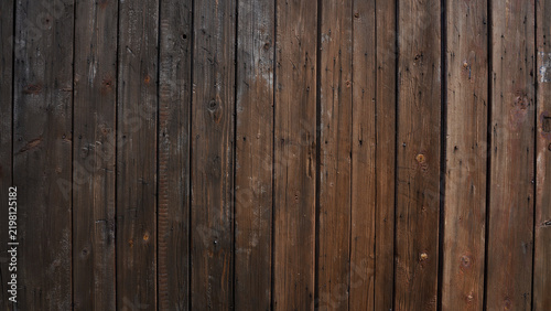 Texture of dark old wooden planks