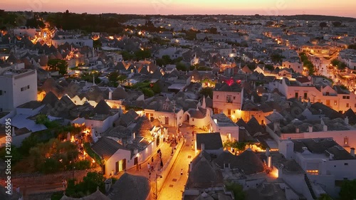 Aerial night view of the illuminated Trulli in Alberobello, Puglia, Italy