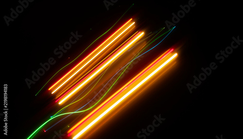 Diagonal Neon Light Trails Background with Glowing Golden Streaks and Motion Blur