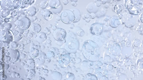 Super Slow Motion Shot of Oil Bubbles Floating in Water at 1000fps.
