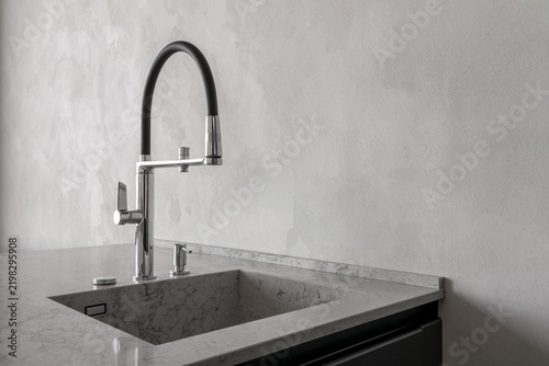 Принти на полотні Contemporary kitchen interior with stone countertop, undermount sink and modern