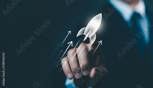 Business growth concept with a businessman launching a glowing rocket and upward arrows, symbolizing startup success, innovation, progress, ambition, expansion, and future opportunities.