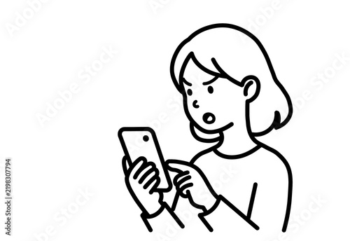 Canvastavla Young woman looking shocked and dismayed at her smartphone