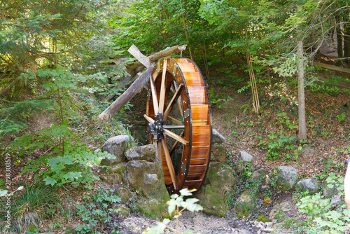Inauguration of new wooden water wheel in the forest at Swiss city of Zürich on a late summer afternoon. Photo taken September 19th, 2026, Zurich Schwamendingen, Switzerland.