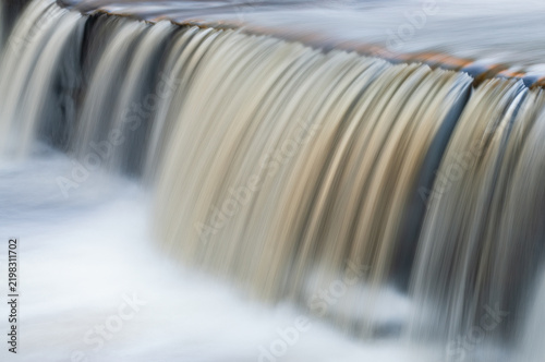 Landscape of a waterfall on the Presque Isle River captured with motion blur, Porcupine Mountains Wilderness State Park, Michigan's Upper Peninsula, USA