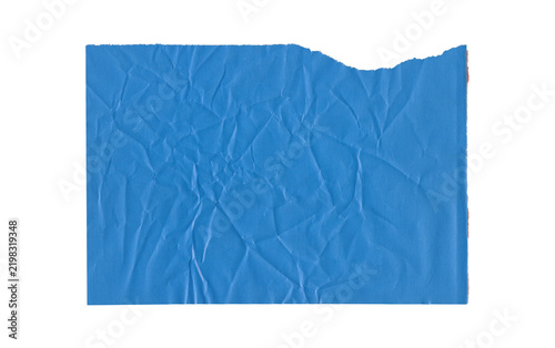 Blue paper sheet with crumpled wrinkles and uneven rough top edge