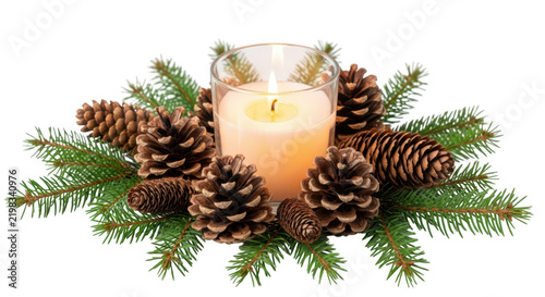 Lit candle in glass with pine cones and green fir branches for christmas decor