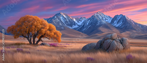 Autumn landscape with snowcapped mountains