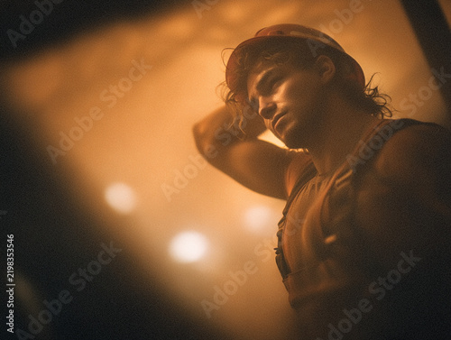 passionate performer on stage with spotlight