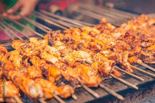 Freshly cooked chicken tikka pieces prepared for making butter chicken (murgh makhani), a popular North Indian curry, in a kitchen with spices and ingredients.