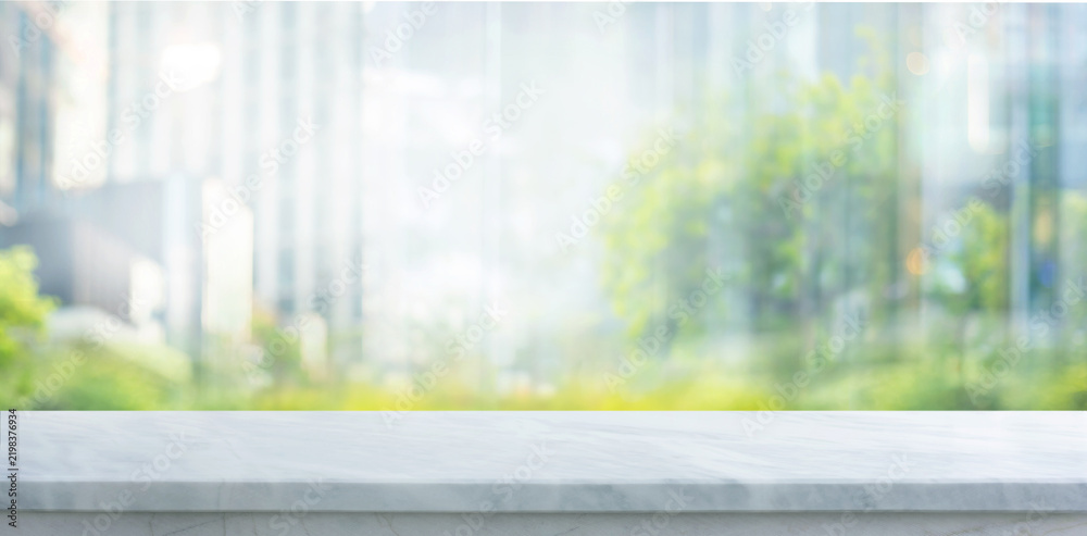 Obraz premium Selective focus.White luxury marble countertop with blue cityscape
