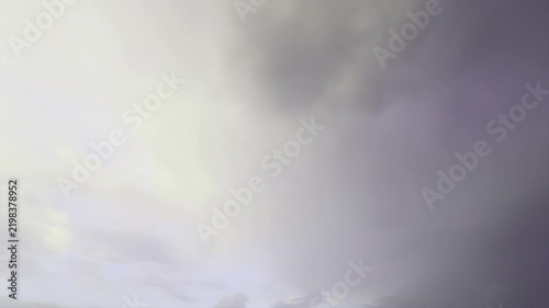 Sky transitions with rapidly moving clouds create a dramatic and dynamic atmosphere. Variations in light and shadow emphasize the depth and texture of the cloud formations.