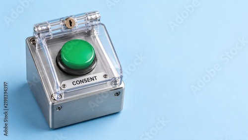 Green Consent Button in Protective Case on Blue Background