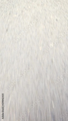 Fast Motion Vertical View of Asphalt Road Surface in Motion 4K