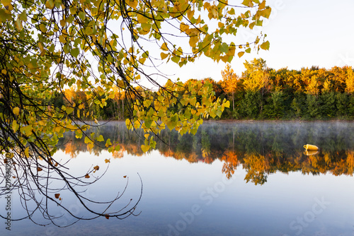 The Sainte-Foy Nature Center small lake Laberge seen with floating fog during a beautiful late September sunrise, Quebec City, Quebec, Canada